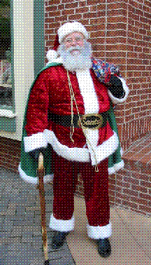 Goodness, Santa Joe is ready for photos anywhere he goes!  This picture was taken at the national Santa Claus Convention for the Amalgamated Order of Real Bearded Santas in Branson, Missouri in 2006.  He does get further south than Minneapolis and Saint Paul, Minnesota, but it's rare.